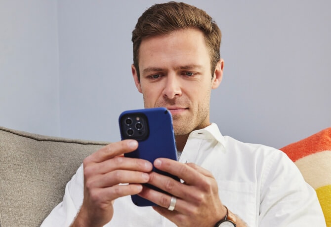 Man looking at a mobile phone